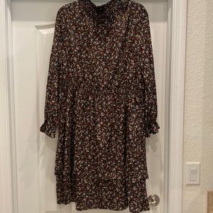 Black long sleeve dress with flowers And sleeve. Layer bottom half. NEW